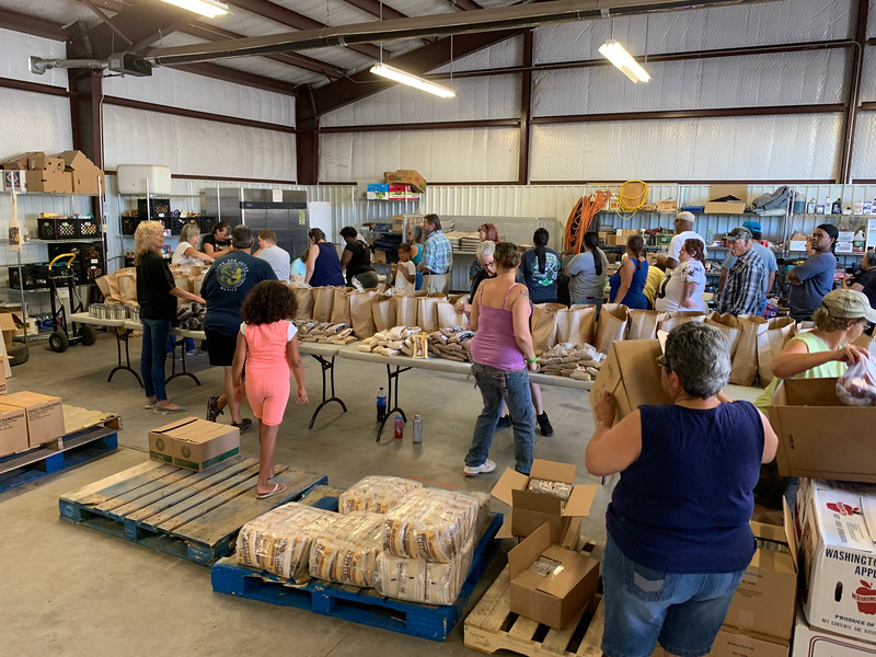 people packing boxes